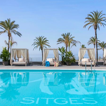Me Sitges Terramar Hotel Exterior foto The pool at the hotel